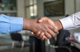 two people shaking hands